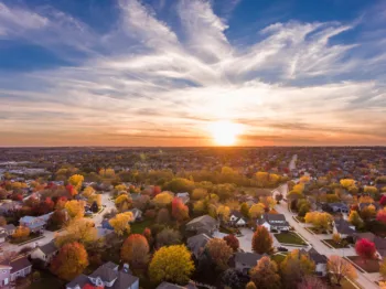 Sunset in the fall over the suburban neighborhood